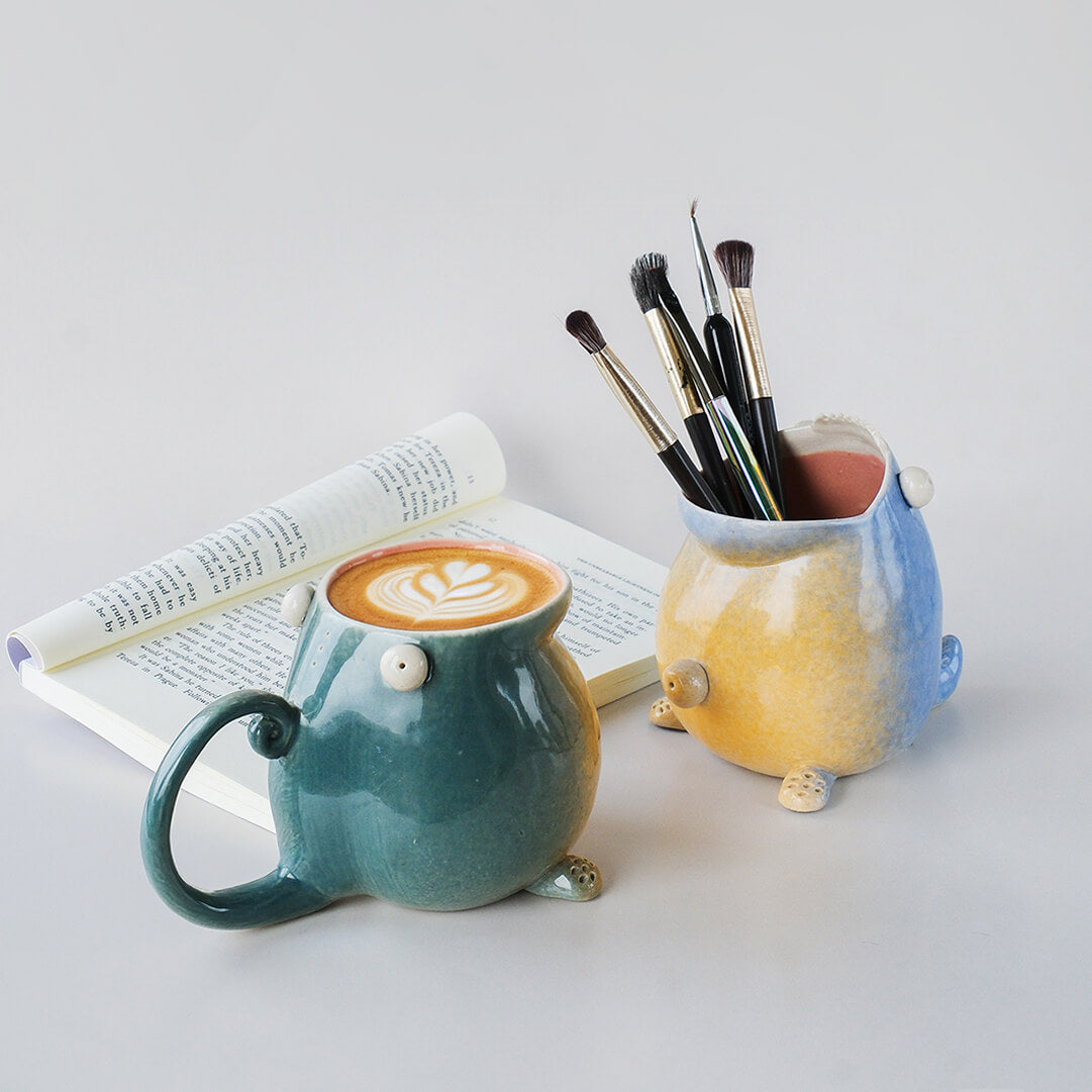 Ceramic holder placed on vanity for brushes 
